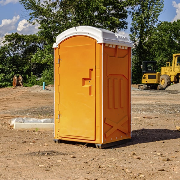 how often are the portable restrooms cleaned and serviced during a rental period in Garber IA